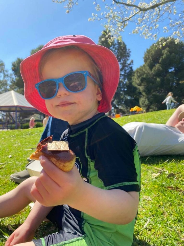 Lauchie eating Icecream in the sun